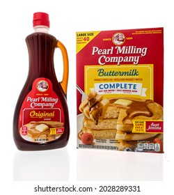 Winneconne, WI -20 August 2021:  A Bottle Of Pearl Milling Company Syrup And Pancake Mix On An Isolated Background