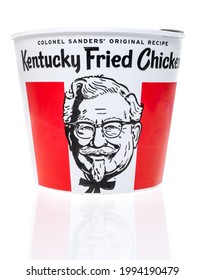 Winneconne, WI - 20 June 2021:  A package of KFC Kentucky Fried Chicken bucket colonel sanders on an isolated background
