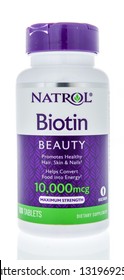 Winneconne, WI - 21 February 2019: A Bottle Of  Natrol Biotin Supplement On An Isolated Background