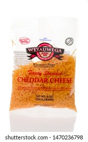 Winneconne, WI - 21 July 2019 : A Package Of Weyauwega Shredded Cheddar Cheese On An Isolated Background