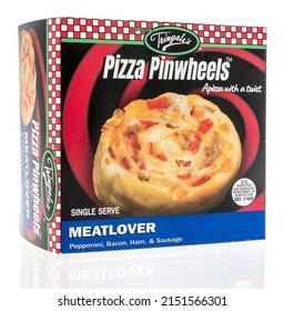 Winneconne, WI -23 April 2022: A Package Of Tringales Pizza Pinwheels Meatlover Pepperoni, Bacon, Ham, Sausage On An Isolated Background