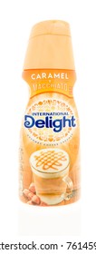 Winneconne, WI - 23 November 2017:  A Bottle Of International Delight Coffee Creamer In Caramel Macchito Flavor On An On An Isolated Background.`