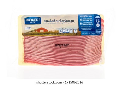 Winneconne,  WI - 26 April 2020:  A Package Of Honeysuckle White Turkey Bacon On An Isolated Background.