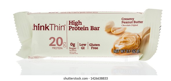 Winneconne, WI - 29 May 2019 : A Package Of Think Thin High Protein Bar In Peanut Butter On An Isolated Background