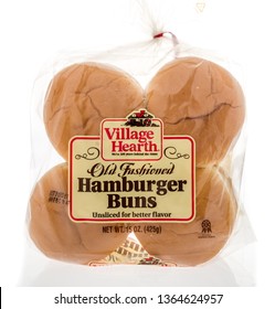 Winneconne, WI -  3 April 2019: A Package Of Village Hearth Old Fashioned Hamburger Buns On An Isolated Background