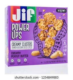 Winneconne, WI - 6 December 2018: A Package Of Jif Power Ups Chewy Granola Clusters On An Isolated Background.