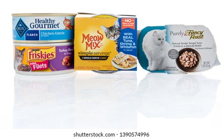 Winneconne, WI -  6 May 2019 : A Pack Of Different Kinds Of Car Food Including Fancy Feast, Friskies, Meow Mix And Blue On An Isolated Background