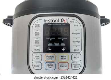 Winneconne, WI -  7 April 2019: An Instant Pot cooking appliance buttons and display on an isolated background