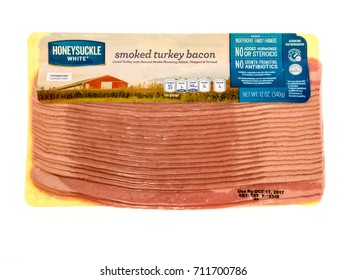 Winneconne, WI - 7 September 2017: A Package Of  Honeysuckle Turkey Bacon On An Isolated Background.