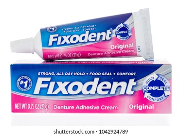 Winneconne, WI - 9 March 2018: A Package Of Fixodent Denture Adhesive Cream On An Isolated Background.