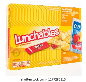 Winneconne, WI - 9 September 2018: A Package Of Lunchables With Kraft Cheese, Capri Sun Drink And A KitKat Candy Bar On An Isolated Background