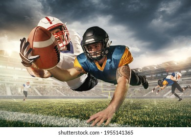 Winner. American football players in fight for goal at stadium in flashlights. Professional sportsmen during game playing in action and motion. Concept of sport, movement, achievements, leadership. - Powered by Shutterstock