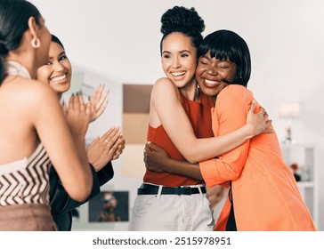 Winner, applause and women hug in meeting for congratulations or achievement in office. Fashion designers, celebrate or excited coworkers with success, magazine agency and promotion for target goals - Powered by Shutterstock