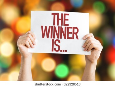 The Winner Is... placard with bokeh background - Shutterstock ID 322328513