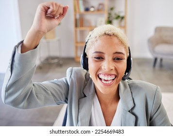 Winner, success or excited black woman in call center company in celebration of winning a business deal. Smile, remote work or happy insurance agent celebrates reaching sales target, goals or mission - Shutterstock ID 2254669483