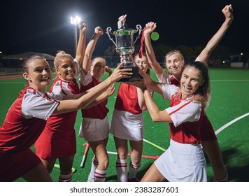 Winner, success and sport with hockey team, girl athlete on field celebrate and trophy after win. Celebration, fitness and teamwork, yes to victory and happy with diversity and sports achievement. - Powered by Shutterstock