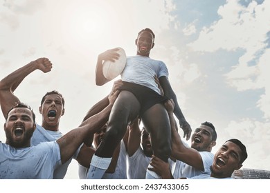 Winners all the way. Portrait of a group of cheerful young rugby players celebrating their win by lifting one of their teammates. - Powered by Shutterstock