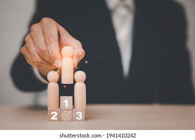 Winners Figures On Pedestal And Losers On Floor, Business Hierarchy, Ranking, Strategy Concept With Wood Doll Standing On Podium 1, 2, 3 Of Wooden Building Blocks, Champions Podium Mockup, Copy Space