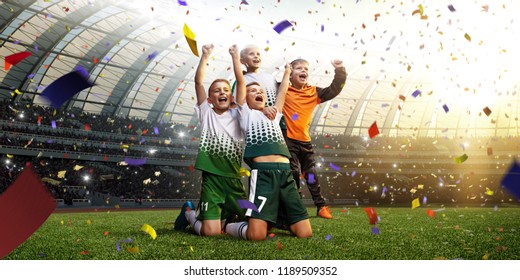 winning football player Children after score in a match confetti and tinsel - Powered by Shutterstock