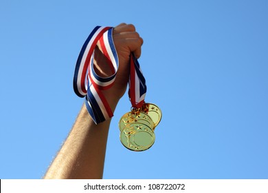 Winning gold medals - Powered by Shutterstock