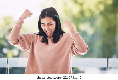 Winning, winner or Indian woman with yes, wow and success fist pump for excited news, bonus or sale. Celebration, freedom and dance, happy young person dancing for opportunity, achievement or results