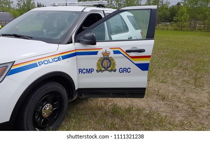 WINNIPEG, CANADA - JUNE, 2018: RCMP Vehicle Stopped On A Patch O