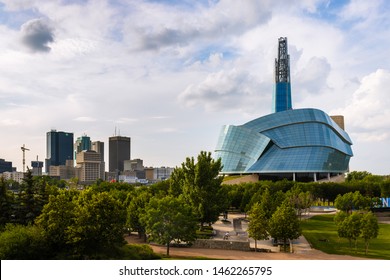 Winnipeg, Manitoba, Canada - July 16, 2019: The Canadian Museum of Human Rights and downtown Winnipeg on a cloudy summer day