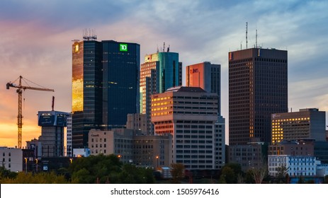 Winnipeg, Manitoba/Canada - September 2019: The buildings of downtown Winnipeg illuminated by golden light near sunset