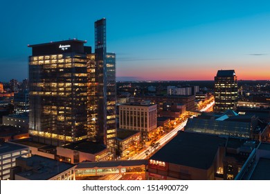 Winnipeg, Manitoba/Canada - September 2019: Downtown Winnipeg at night. Long exposure shot capturing light streaks of vehicles moving through Portage Avenue
