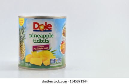 Winnipeg, Manitoba-October 30, 2019: Can Of Dole Pineapple Tidbits.  Dole Food Company Is An American Agricultural Corporation Based In Westlake Village,California.