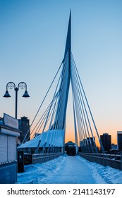 Winnipeg, MB, Canada - March 2022: The Esplanade Riel Foot Bridge During A Winter Sunset