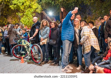 Winnipeg, MB, Canada - September 2022: People Taking Selfies While Watching An Outdoor Street Performance