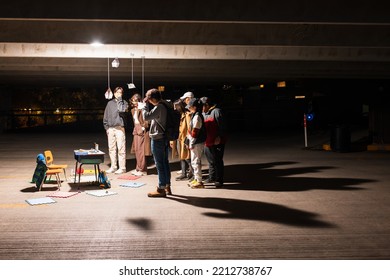 Winnipeg, MB, Canada - September 2022: People Looking At An Art Installation At The Forks Parking Lot During Nuit Blanche