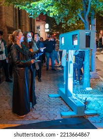 Winnipeg, MB, Canada - September 2022: People Looking At An Interactive Art Display At Nuit Blanche