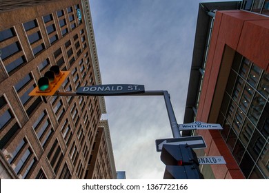 Winnipeg, MB/Canada - April 10, 2019: Looking Up At A Street Sign For Donald Street, Renamed Whiteout Way For The Stanley Cup Playoffs In Winnipeg. Blue Sky With A Few Clouds In The Background