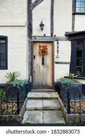 WINSLOW, UK - December 29, 2019. UK Heritage House Or Cottage At Christmas In Winter