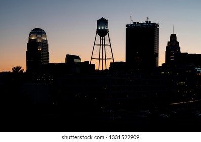 Winston Salem, NC/United States- 03/05/2019: The Winston Salem skyline forms a silhouette against the evening sky.