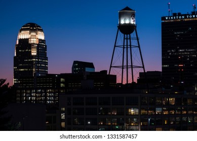 Winston Salem, NC/United States- 03/05/2019: Silhouette Of The Winston Salem Skyline Against A Colorful Night Sky.