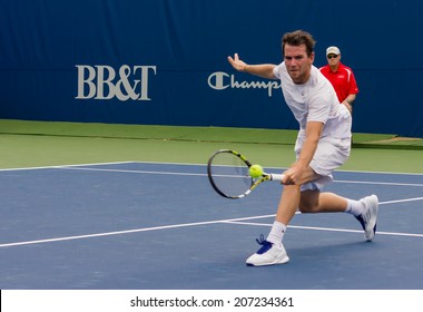 WINSTON-SALEM, NC, USA - AUGUST 18: Adrian Mannarino Plays On Center Court At The Winston-Salem Open On August 18, 2013 In Winston-Salem, NC, USA