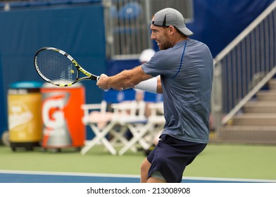 WINSTON-SALEM, NC, USA - AUGUST 18: Robby Ginepri Plays Center Court At The Winston-Salem Open On August 18, 2014 In Winston-Salem, NC, USA