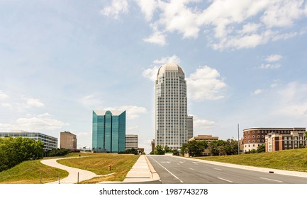 WINSTON-SALEM, NC, USA-1 JUNE 2021: Wide angle, ground level cityscape of Winston-Salem dominated by Wells Fargo Center and the BBandT building on a sunny, blue sky day. Horizontal image.