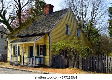 WINSTON-SALEM, USA, MAR 2017: Colorful Old Yellow Wooden House In The Traditional Moravian Settlement At Old Salem Museums And Gardens.