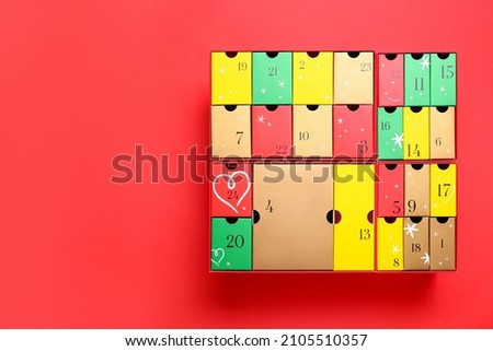 Winter advent calendar on red background