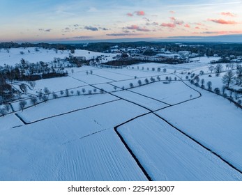 winter aerial landscape view of village and farmland - Shutterstock ID 2254913007