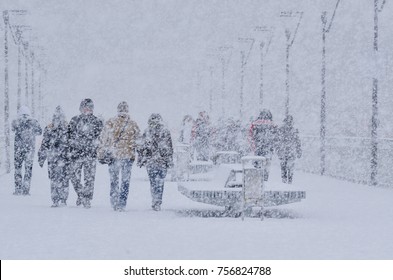 WINTER ATTACK - People walking through the blizzard