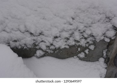 Winter Background, Adhering Snow, Beautiful Cut Of Large Snow On A Metal Construction Sheet With Mounds And Hollows