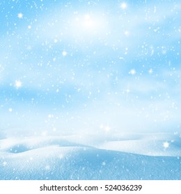 Winter background. Winter christmas bright landscape with snowdrifts and falling snow.