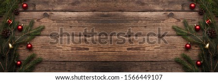 winter Background - Frame made of snow on wooden texture, top view with space for text