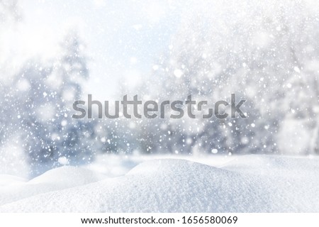 Winter background with heavy snow. Abstract snow among trees and snowdrift