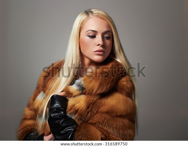 woman in fur coat